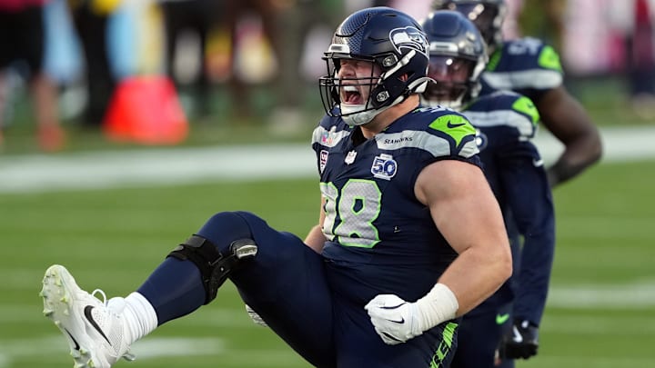 Feb 8, 2026; Santa Clara, CA, USA; Seattle Seahawks defensive tackle Rylie Mills (98) reacts after a sack against the New England Patriots during the second quarter in Super Bowl LX at Levi's Stadium. Mandatory Credit: Darren Yamashita-Imagn Images