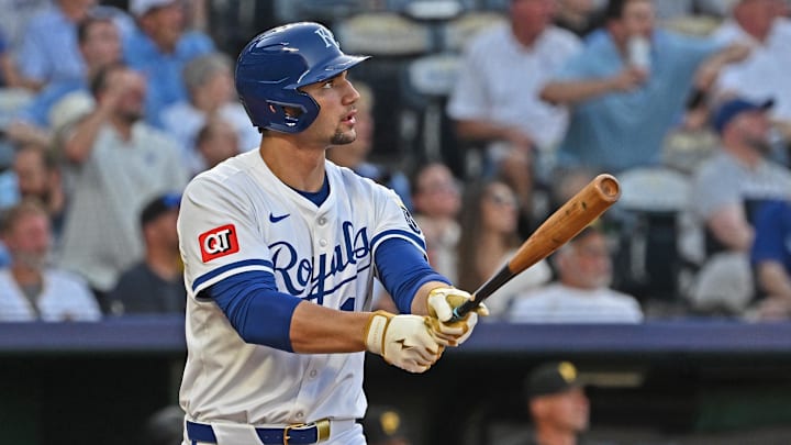Jul 9, 2025; Kansas City, Missouri, USA;  Kansas City Royals right fielder Jac Caglianone (14) hits a two-run home run in the fourth inning against the Pittsburgh Pirates at Kauffman Stadium. Mandatory Credit: Peter Aiken-Imagn Images