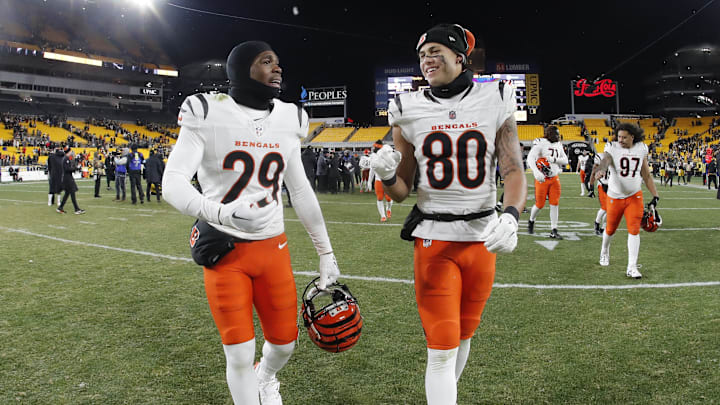 Jan 4, 2025; Pittsburgh, Pennsylvania, USA;  Cincinnati Bengals cornerback Cam Taylor-Britt (29) and wide receiver Andrei Iosivas (80) react as they leave the field after defeating the Pittsburgh Steelers at Acrisure Stadium. Mandatory Credit: Charles LeClaire-Imagn Images