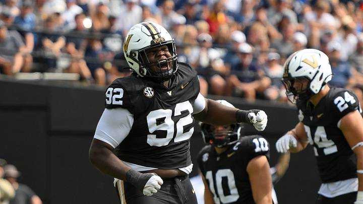 Sep 27, 2025; Nashville, Tennessee, USA; Vanderbilt Commodores defensive lineman Jaylon Stone (92) celebrates the sack of Utah State Aggies quarterback Bryson Barnes (16) during the first half at FirstBank Stadium. Mandatory Credit: Steve Roberts-Imagn Images Sep 27, 2025; Nashville, Tennessee, USA; Vanderbilt Commodores defensive lineman Jaylon Stone (92) celebrates the sack of Utah State Aggies quarterback Bryson Barnes (16) during the first half at FirstBank Stadium. Mandatory Credit: Steve Roberts-Imagn Images