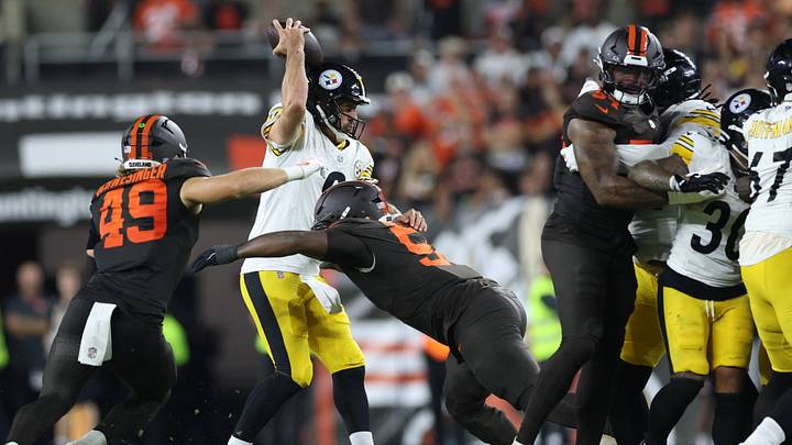 Oct 1, 2026; Cleveland, Ohio, USA;  Cleveland Browns defensive tackle Mike Hall Jr. (51) sacks Pittsburgh Steelers quarterback Aaron Rodgers (8) in the second half at Huntington Bank Field.  Mandatory Credit: Scott Galvin-Imagn Images