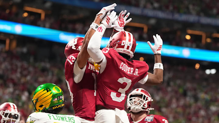 Jan 9, 2026; Atlanta, GA, USA; Indiana Hoosiers wide receivers Omar Cooper Jr. (3) and Elijah Sarratt (13) celebrate Cooper's touchdown catch during the first half of the 2025 Peach Bowl and semifinal game of the College Football Playoff.
