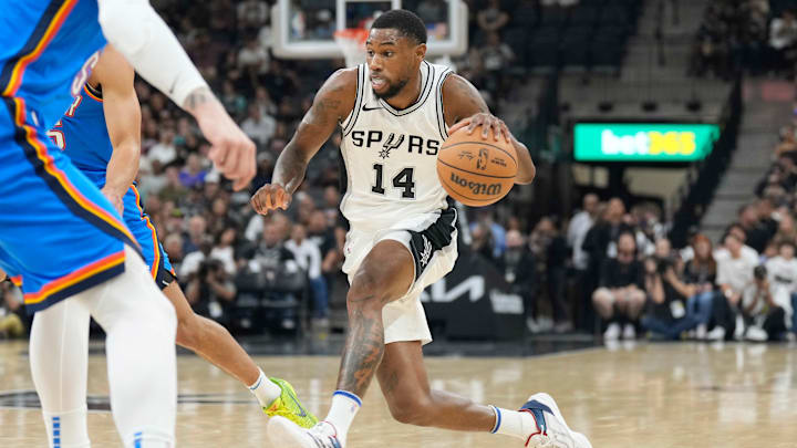 Oct 7, 2024; San Antonio, Texas, USA; San Antonio Spurs guard Blake Wesley (14) drives to the basket during the first half against the Oklahoma City Thunder at Frost Bank Center. Oct 7, 2024; San Antonio, Texas, USA; San Antonio Spurs guard Blake Wesley (14) drives to the basket during the first half against the Oklahoma City Thunder at Frost Bank Center.