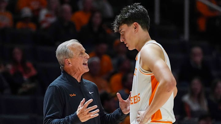 Tennessee coach Rick Barnes speaks with Tennessee forward J.P. Estrella (13) on the sidelines during a NCAA basketball game between Tennessee Volunteers and North Florida Ospreys at Thompson-Boling Arena at Food City Center in Knoxville, Tenn. on Nov. 12, 2025.
