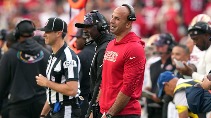 Sep 28, 2025; Santa Clara, California, USA; San Francisco 49ers defensive coordinator Robert Saleh (in red) reacts to a penalty during the third quarter against the Jacksonville Jaguars at Levi's Stadium. Mandatory Credit: Darren Yamashita-Imagn Images Sep 28, 2025; Santa Clara, California, USA; San Francisco 49ers defensive coordinator Robert Saleh (in red) reacts to a penalty during the third quarter against the Jacksonville Jaguars at Levi's Stadium. Mandatory Credit: Darren Yamashita-Imagn Images