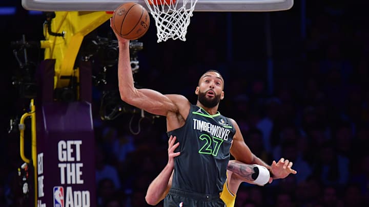 Minnesota Timberwolves center Rudy Gobert gets the ball against Los Angeles Lakers guard Luka Doncic during the first half in Game 5 of their first-round playoff series at Crypto.com Arena in Los Angeles on April 30, 2025. 