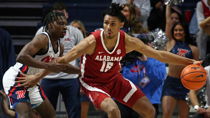 Feb 28, 2024; Oxford, Mississippi, USA; Alabama Crimson Tide forward Jarin Stevenson (15) dribbles as Mississippi Rebels guard Jaylen Murray (5) defends during the second half at The Sandy and John Black Pavilion at Ole Miss. Mandatory Credit: Petre Thomas-Imagn Images Feb 28, 2024; Oxford, Mississippi, USA; Alabama Crimson Tide forward Jarin Stevenson (15) dribbles as Mississippi Rebels guard Jaylen Murray (5) defends during the second half at The Sandy and John Black Pavilion at Ole Miss. Mandatory Credit: Petre Thomas-Imagn Images