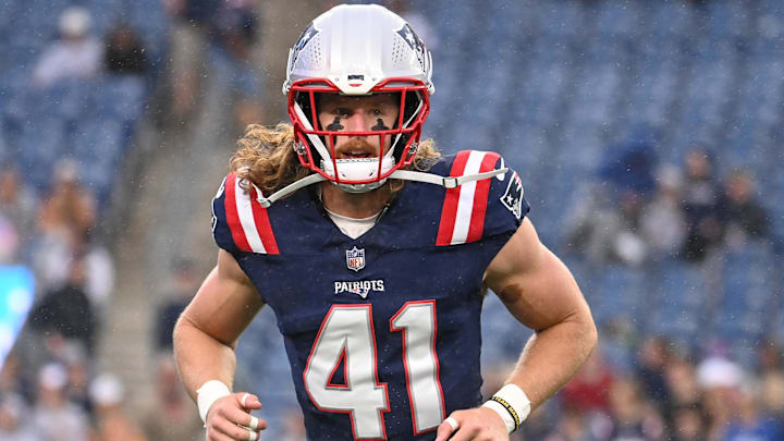 August 8, 2024; Foxborough, MA, USA;  New England Patriots safety Brenden Schooler (41) warms up before a game against the Carolina Panthers at Gillette Stadium. Mandatory Credit: Eric Canha-Imagn Images