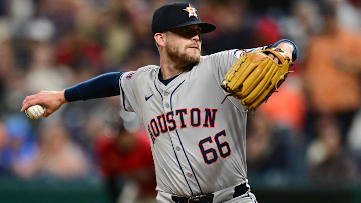 Houston Astros relief pitcher Shawn Dubin throws a pitch during the ninth inning against the Cleveland Guardians. .