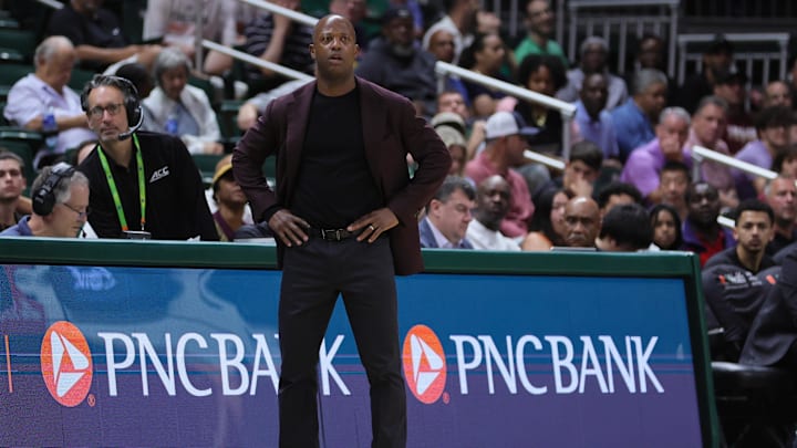 Mar 6, 2024; Coral Gables, Florida, USA; Boston College Eagles head coach Earl Grant watches from the sideline against the Miami Hurricanes during the first half at Watsco Center. Mandatory Credit: Sam Navarro-Imagn Images
