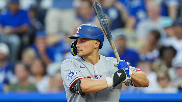 Texas Rangers shortstop Corey Seager (5) bats.