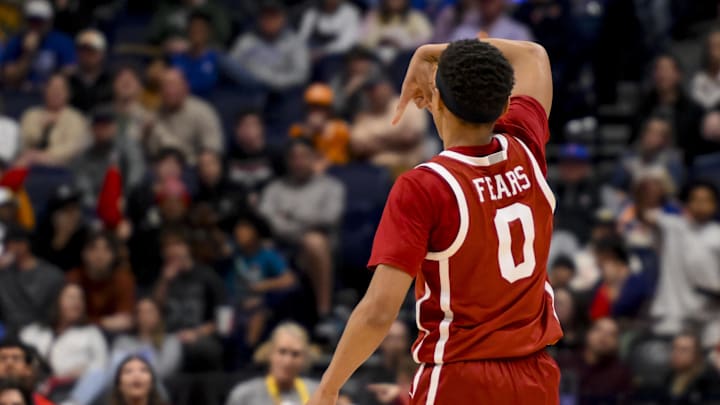 Mar 12, 2025; Nashville, TN, USA;  Oklahoma Sooners guard Jeremiah Fears (0) reacts after a made three point basket  against the Georgia Bulldogs during the first half at Bridgestone Arena. Mandatory Credit: Steve Roberts-Imagn Images