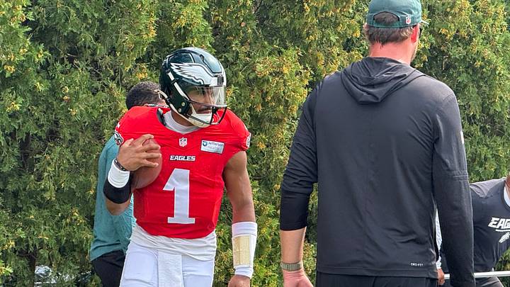 Jalen Hurts goes through a drill during Eagles training camp in 2026. Jalen Hurts goes through a drill during Eagles training camp in 2026.