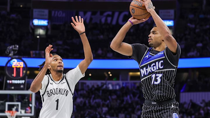 Nov 14, 2025; Orlando, Florida, USA; Orlando Magic guard Jett Howard (13) shoots a three point basket over Brooklyn Nets forward Ziaire Williams (1) during the second half at Kia Center. Mandatory Credit: Mike Watters-Imagn Images Nov 14, 2025; Orlando, Florida, USA; Orlando Magic guard Jett Howard (13) shoots a three point basket over Brooklyn Nets forward Ziaire Williams (1) during the second half at Kia Center. Mandatory Credit: Mike Watters-Imagn Images