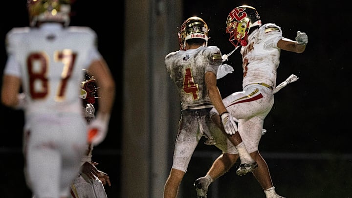 Bergen Catholic's Bryan Porter and Austin Busso, right, celebrate a touchdown against West Boca Raton during the Adidas Football Classic.