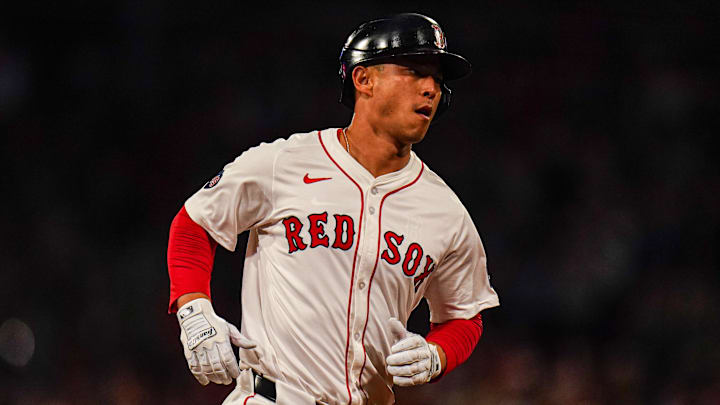 Sep 9, 2024; Boston, Massachusetts, USA; Boston Red Sox right fielder Rob Refsnyder (30) hits a two run home run against the Baltimore Orioles in the third inning at Fenway Park. Mandatory Credit: David Butler II-Imagn Images