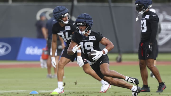 Jul 23, 2025; Houston, TX, USA;  Houston Texans wide receiver Xavier Hutchinson (19) during training camp at Houston Methodist Training Center. Mandatory Credit: Troy Taormina-Imagn Images