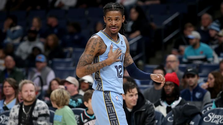 Jan 21, 2026; Memphis, Tennessee, USA; Memphis Grizzlies guard Ja Morant (12) reacts during the first quarter against the Atlanta Hawks at FedExForum. Mandatory Credit: Petre Thomas-Imagn Images