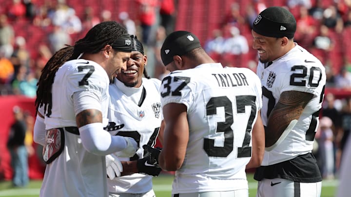Dec 8, 2024; Tampa, Florida, USA; Las Vegas Raiders safety Tre'von Moehrig (7), safety Thomas Harper (34), safety Trey Taylor (37) and safety Isaiah Pola-Mao (20) prior to the game against the Tampa Bay Buccaneers at Raymond James Stadium. Mandatory Credit: Kim Klement Neitzel-Imagn Images Dec 8, 2024; Tampa, Florida, USA; Las Vegas Raiders safety Tre'von Moehrig (7), safety Thomas Harper (34), safety Trey Taylor (37) and safety Isaiah Pola-Mao (20) prior to the game against the Tampa Bay Buccaneers at Raymond James Stadium. Mandatory Credit: Kim Klement Neitzel-Imagn Images