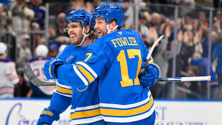 Mar 13, 2026; St. Louis, Missouri, USA; St. Louis Blues center Robert Thomas (18) celebrates with defenseman Cam Fowler (17) after scoring the game winning goal against the Edmonton Oilers during overtime at Enterprise Center. Mandatory Credit: Jeff Curry-Imagn Images