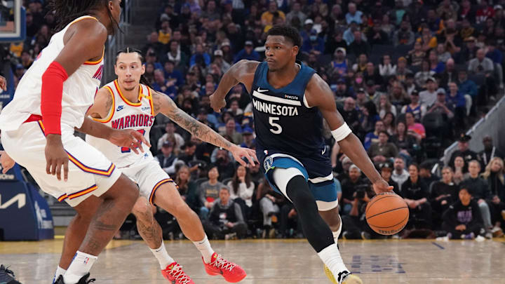 Dec 8, 2024; San Francisco, California, USA;  Minnesota Timberwolves guard Anthony Edwards (5) drives to the basket against Golden State Warriors forward Lindy Waters III (43) in the second period at Chase Center. Mandatory Credit: David Gonzales-Imagn Images