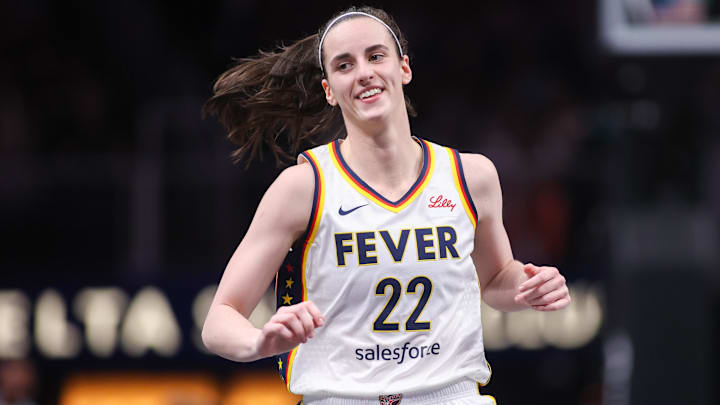 Indiana Fever guard Caitlin Clark (22) reacts after a basket against the Atlanta Dream in the first half at State Farm Arena. Indiana Fever guard Caitlin Clark (22) reacts after a basket against the Atlanta Dream in the first half at State Farm Arena.