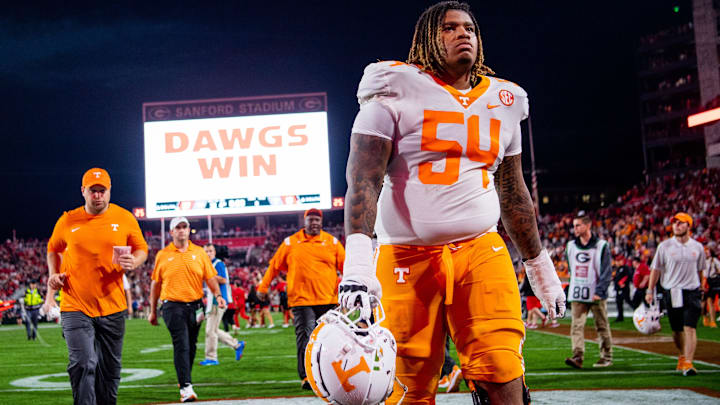 Tennessee offensive lineman Gerald Mincey (54) walks off the field after Tennessee's game against