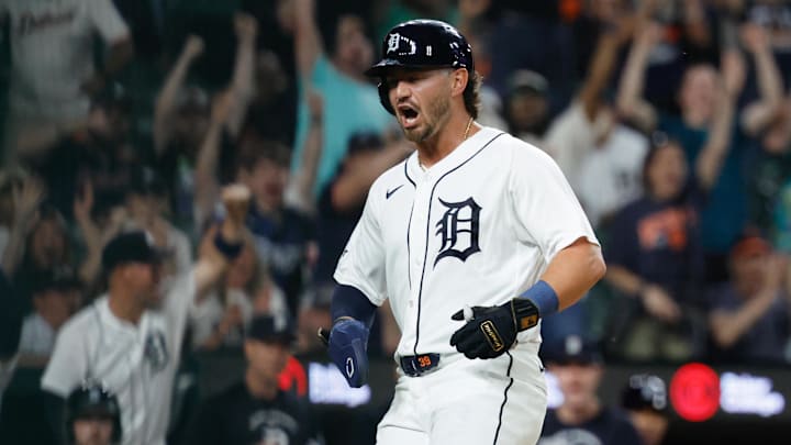 Apr 14, 2026; Detroit, Michigan, USA;  Detroit Tigers third baseman Zach McKinstry (39) celebrates after scoring in the eighth inning against the Kansas City Royals at Comerica Park. Mandatory Credit: Rick Osentoski-Imagn Images