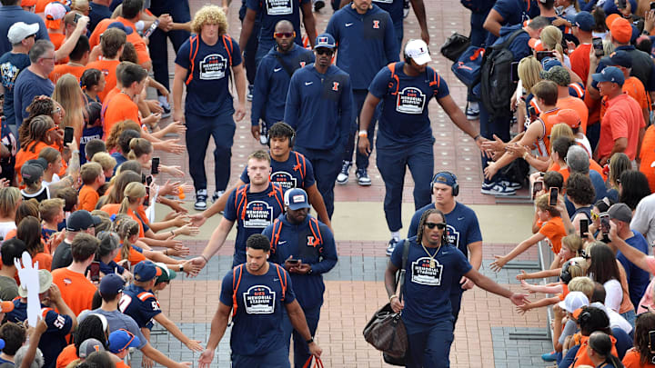 Sep 13, 2025; Champaign, Illinois, USA; Illinois Fighting Illini players arrive before an NCAA game against the Western Michigan Broncos at Memorial Stadium. Mandatory Credit: Ron Johnson-Imagn Images Sep 13, 2025; Champaign, Illinois, USA; Illinois Fighting Illini players arrive before an NCAA game against the Western Michigan Broncos at Memorial Stadium. Mandatory Credit: Ron Johnson-Imagn Images