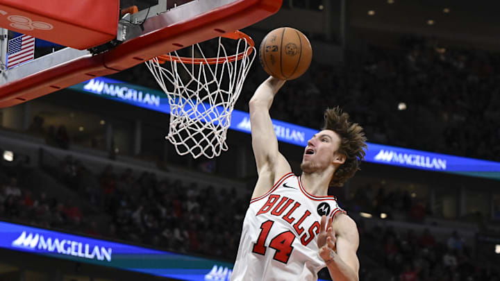 Mar 10, 2025; Chicago, Illinois, USA; Chicago Bulls forward Matas Buzelis (14) dunks the ball against the Indiana Pacers 