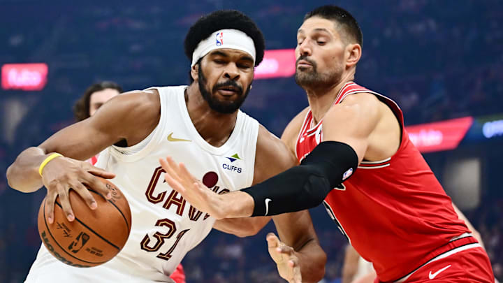 Oct 7, 2025; Cleveland, Ohio, USA; Cleveland Cavaliers center Jarrett Allen (31) drives to the basket against Chicago Bulls center Nikola Vucevic (9) during the first quarter at Rocket Arena. Mandatory Credit: Ken Blaze-Imagn Images