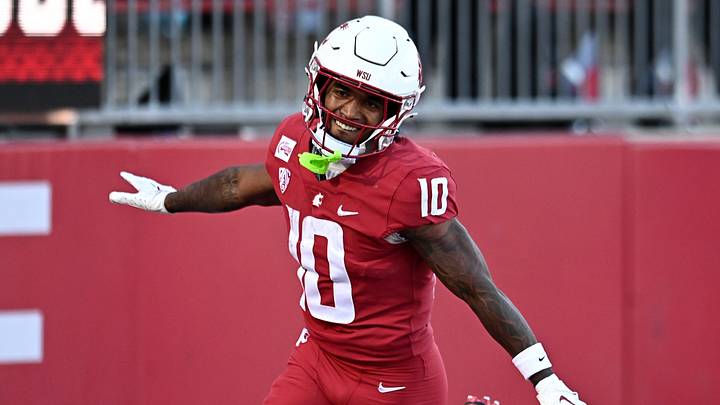 Washington State Cougars wide receiver Tank Hawkins Jr. (10) celebrates after returning a punt for a touchdown against the Duquesne Dukes during the second half at Gesa Field at Martin Stadium. Washington State Cougars wide receiver Tank Hawkins Jr. (10) celebrates after returning a punt for a touchdown against the Duquesne Dukes during the second half at Gesa Field at Martin Stadium.