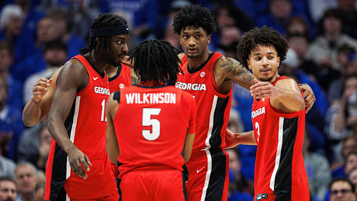 Feb 17, 2026; Lexington, Kentucky, USA; Georgia Bulldogs forward Jake Wilkins (21), forward Dylan James (11), guard Jeremiah Wilkinson (5), and guard Jordan Ross (3) huddle up during the first half against the Kentucky Wildcats at Rupp Arena at Central Bank Center. Mandatory Credit: Jordan Prather-Imagn Images