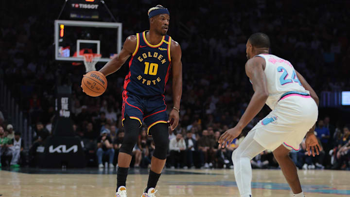 Mar 25, 2025; Miami, Florida, USA; Golden State Warriors forward Jimmy Butler III (10) dribbles the basketball as Miami Heat forward Haywood Highsmith (24) defends during the first quarter at Kaseya Center. Mandatory Credit: Sam Navarro-Imagn Images Mar 25, 2025; Miami, Florida, USA; Golden State Warriors forward Jimmy Butler III (10) dribbles the basketball as Miami Heat forward Haywood Highsmith (24) defends during the first quarter at Kaseya Center. Mandatory Credit: Sam Navarro-Imagn Images