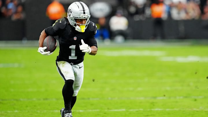 Oct 12, 2025; Paradise, Nevada, USA; Las Vegas Raiders wide receiver Tre Tucker (1) runs the ball down the field during the second half against the Tennessee Titans at Allegiant Stadium. Mandatory Credit: Stephen R. Sylvanie-Imagn Images