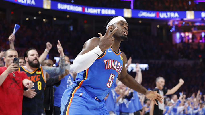 May 9, 2024; Oklahoma City, Oklahoma, USA; Oklahoma City Thunder guard Luguentz Dort (5) gestures after scoring a three-point basket against the Dallas Mavericks during the second quarter of game two of the second round for the 2024 NBA playoffs at Paycom Center. Mandatory Credit: Alonzo Adams-Imagn Images
