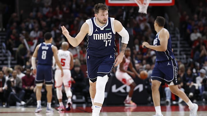 Mar 11, 2024; Chicago, Illinois, USA; Dallas Mavericks guard Luka Doncic (77) reacts after scoring