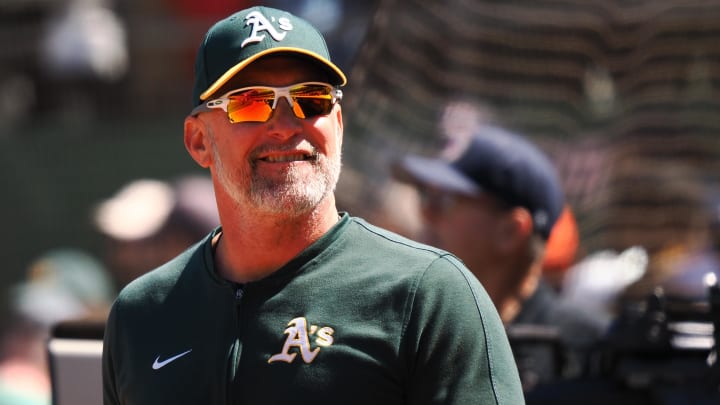 May 25, 2024; Oakland, California, USA; Oakland Athletics manager Mark Kotsay (7) smiles after the game against the Houston Astros at Oakland-Alameda County Coliseum. Mandatory Credit: Kelley L Cox-USA TODAY Sports