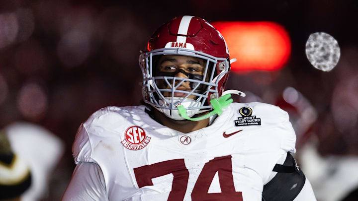 Dec 19, 2025; Norman, OK, USA; Alabama Crimson Tide offensive lineman Kadyn Proctor (74) against the Oklahoma Sooners during the CFP National Playoff First Round at Gaylord Family Oklahoma Memorial Stadium. Mandatory Credit: Mark J. Rebilas-Imagn Images