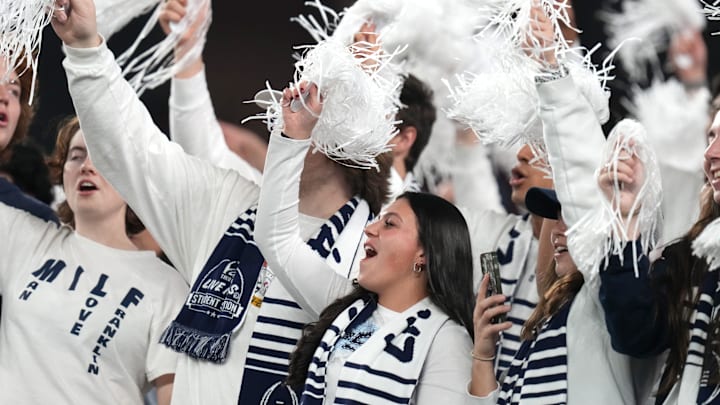 Penn State football fans cheer the Nittany Lions during the 2024 Fiesta Bowl in the College Football Playoff. 