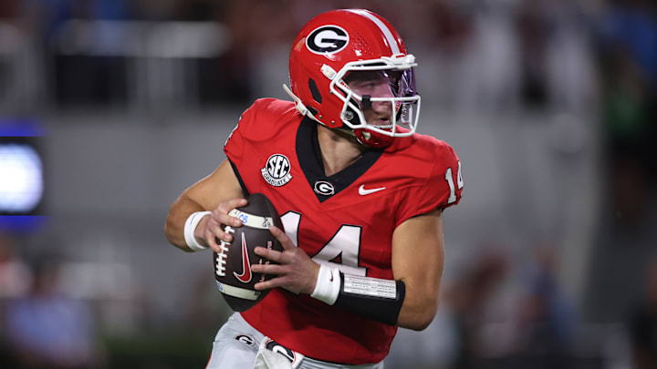 Sep 27, 2025; Athens, Georgia, USA;  Georgia Bulldogs quarterback Gunner Stockton (14) looks to pass against the Alabama Crimson Tide in the first half at Sanford Stadium. Mandatory Credit: Brett Davis-Imagn Images