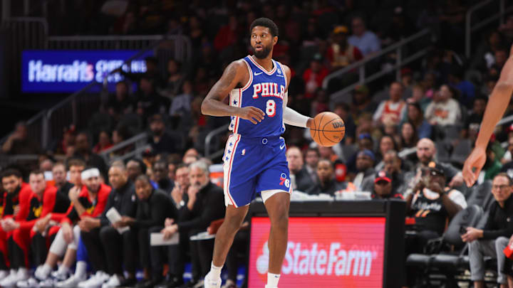 Oct 14, 2024; Atlanta, Georgia, USA; Philadelphia 76ers forward Paul George (8) dribbles against the Atlanta Hawks in the first quarter at State Farm Arena. Mandatory Credit: Brett Davis-Imagn Images