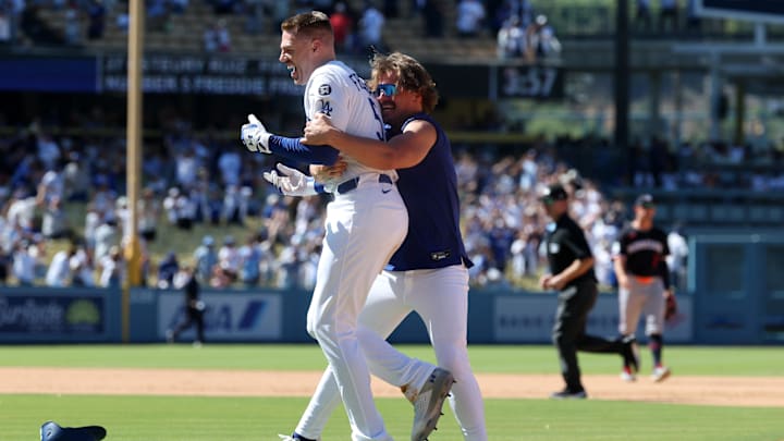 Jul 23, 2025; Los Angeles, California, USA; Los Angeles Dodgers first baseman Freddie Freeman (5, left) celebrates with Enrique Hernandez (8) after hitting a game winning RBI single in the ninth inning against the Minnesota Twins at Dodger Stadium. Jul 23, 2025; Los Angeles, California, USA; Los Angeles Dodgers first baseman Freddie Freeman (5, left) celebrates with Enrique Hernandez (8) after hitting a game winning RBI single in the ninth inning against the Minnesota Twins at Dodger Stadium.