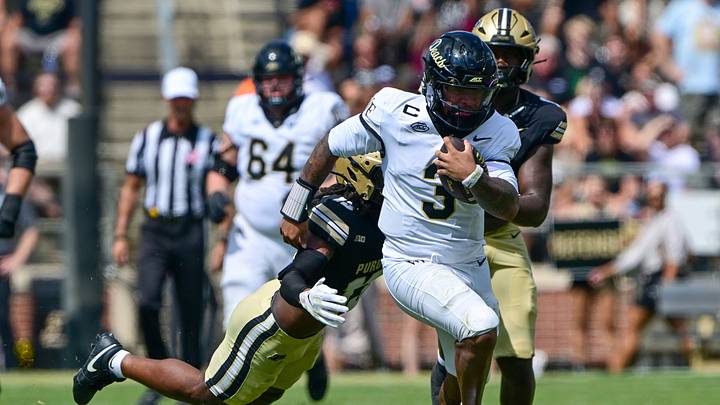 Sep 12, 2026; West Lafayette, Indiana, USA; Wake Forest Demon Deacons quarterback Gio Lopez (3) is tackled by Purdue Boilermakers defensive back John Slaughter (13) during the second half at Ross-Ade Stadium. Mandatory Credit: Marc Lebryk-Imagn Images Sep 12, 2026; West Lafayette, Indiana, USA; Wake Forest Demon Deacons quarterback Gio Lopez (3) is tackled by Purdue Boilermakers defensive back John Slaughter (13) during the second half at Ross-Ade Stadium. Mandatory Credit: Marc Lebryk-Imagn Images