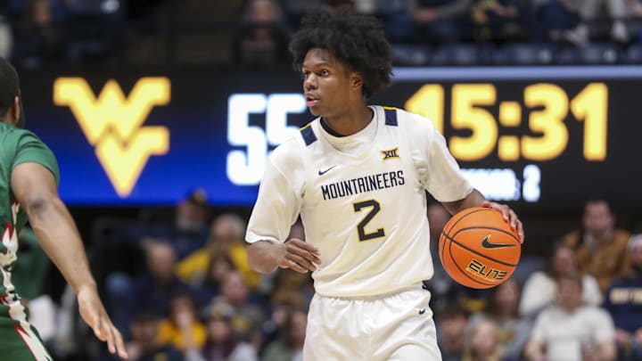 Dec 22, 2025; Morgantown, West Virginia, USA; West Virginia Mountaineers guard Amir Jenkins (2) dribbles the ball during the second half against the Mississippi Valley State Delta Devils at Hope Coliseum. Mandatory Credit: Ben Queen-Imagn Images