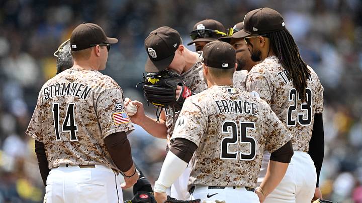 Apr 12, 2026; San Diego, California, USA; San Diego Padres starting pitcher Nick Pivetta (27), center, reacts before leaving the game during the fourth inning against the Colorado Rockies at Petco Park. Mandatory Credit: Denis Poroy-Imagn Images Apr 12, 2026; San Diego, California, USA; San Diego Padres starting pitcher Nick Pivetta (27), center, reacts before leaving the game during the fourth inning against the Colorado Rockies at Petco Park. Mandatory Credit: Denis Poroy-Imagn Images