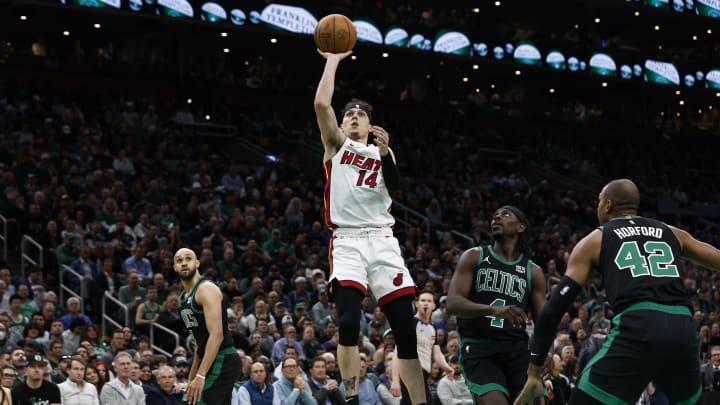 May 1, 2024; Boston, Massachusetts, USA; Miami Heat guard Tyler Herro (14) shoots as Boston Celtics guard Jrue Holiday (4) looks on during the first quarter of game five of the first round of the 2024 NBA playoffs at TD Garden. Mandatory Credit: Winslow Townson-USA TODAY Sports May 1, 2024; Boston, Massachusetts, USA; Miami Heat guard Tyler Herro (14) shoots as Boston Celtics guard Jrue Holiday (4) looks on during the first quarter of game five of the first round of the 2024 NBA playoffs at TD Garden. Mandatory Credit: Winslow Townson-USA TODAY Sports
