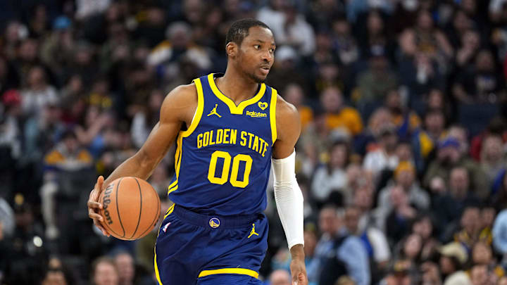 Feb 23, 2024; San Francisco, California, USA; Golden State Warriors forward Jonathan Kuminga (00) dribbles against the Charlotte Hornets during the first quarter at Chase Center. Mandatory Credit: Darren Yamashita-Imagn Images Feb 23, 2024; San Francisco, California, USA; Golden State Warriors forward Jonathan Kuminga (00) dribbles against the Charlotte Hornets during the first quarter at Chase Center. Mandatory Credit: Darren Yamashita-Imagn Images