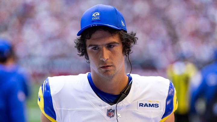 Dec 7, 2025; Glendale, Arizona, USA; Los Angeles Rams quarterback Stetson Bennett IV (13) against the Arizona Cardinals at State Farm Stadium. Mandatory Credit: Mark J. Rebilas-Imagn Images