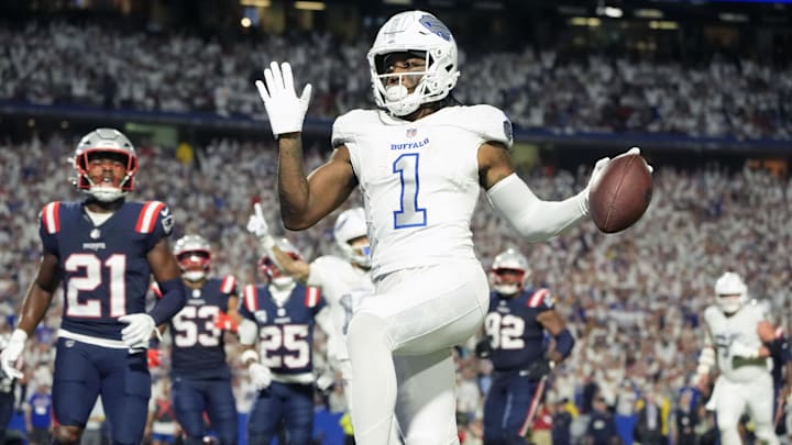Oct 5, 2025; Orchard Park, New York, USA; Buffalo Bills wide receiver Curtis Samuel (1) scores a touchdown against the New England Patriots during the second half at Highmark Stadium. Mandatory Credit: Gregory Fisher-Imagn Images